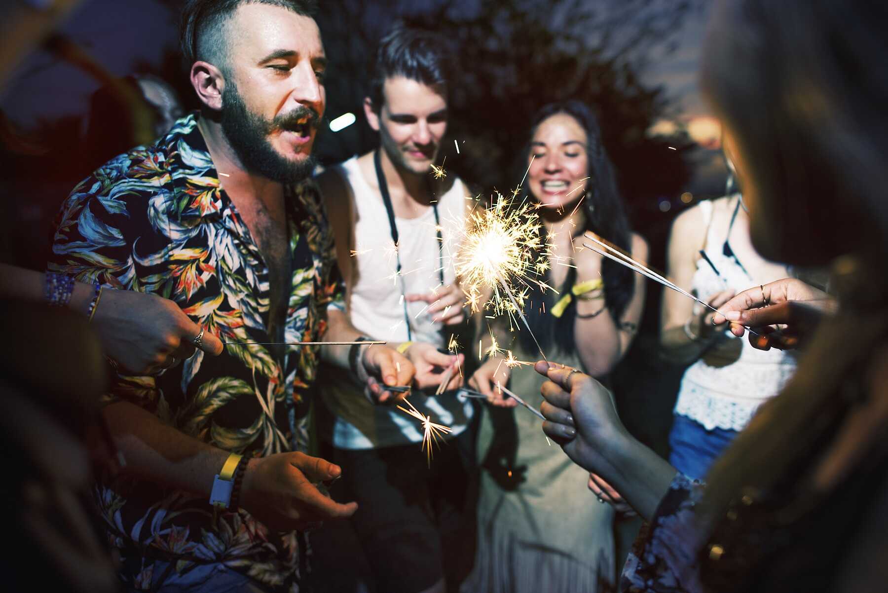 people-enjoying-sparkler-in-festival-event-PFP9AJR.jpg